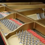used grand piano inspected by Steinway technicians