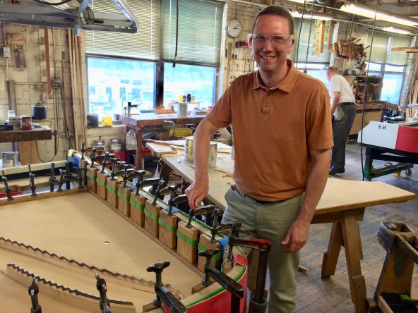 Grant helping out at the Steinway factory